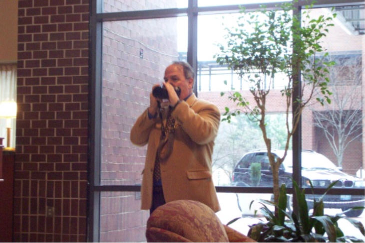 My father, taking better photographs than these